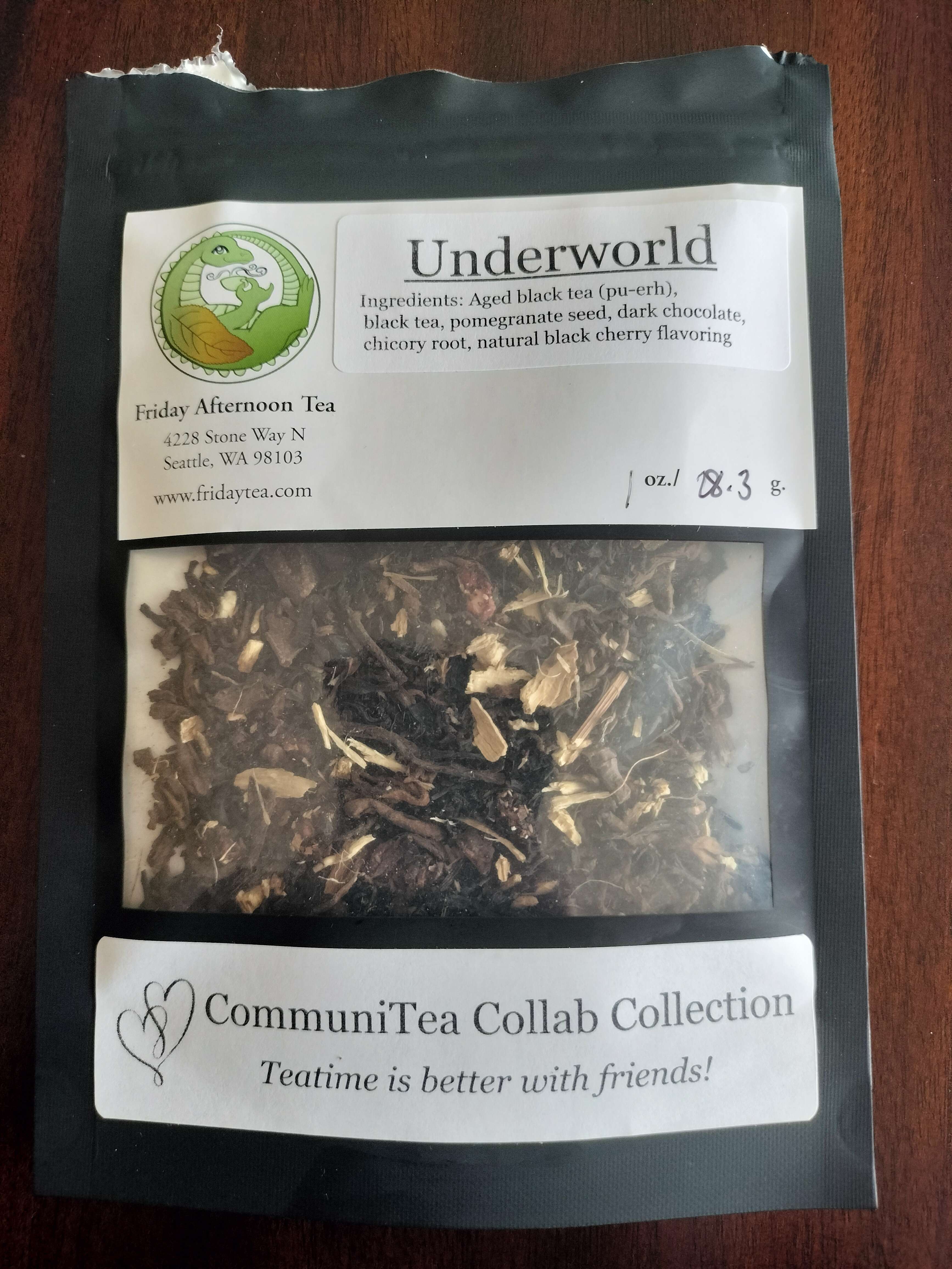 The tea blend Underworld from Friday Afternoon Tea. Ingredients are aged black tea (pu-erh), black tea, pomegranate seed, dark chocolate, chicory root, and natural black cherry flavoring.